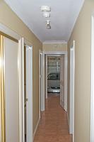  looking down the hallway from near to kitchen to the garage